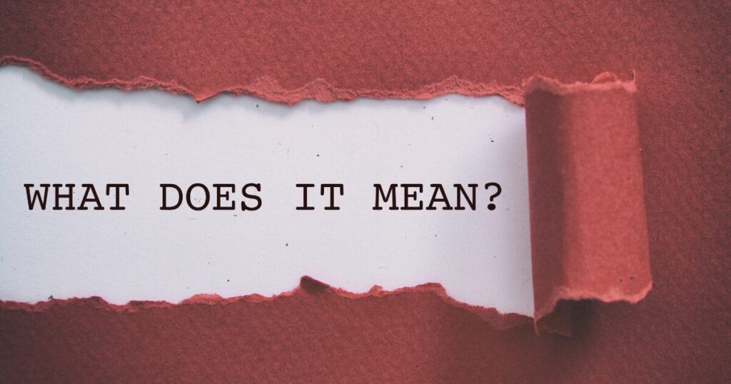 Torn red paper reveals a white strip with the question: 'WHAT DOES IT MEAN?'
